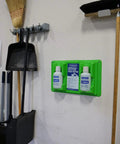 PhysiciansCare wall-mount emergency eyewash station, green, with two 32 oz eyewash bottles and instruction panel.