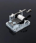 Hand Crank Music Box Movement 18 Note Mechanical Metal Mechanism for DIYers Jewelry Box and Woodworking Projects 7.5cm Length Replacement Part With Pre Drilled Mounting Holes, side view