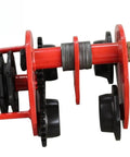 No Fuss Heavy Lifter Hand Chain Hoist With Integrated Monorail Trolley For Standard I Beam Structures In Warehouses And Workshops Featuring A Smooth Five Ton Manual Pull System That Gets The Job Done Right, showing red gear mechanism and roller assembly.