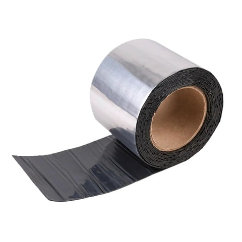 Heavy Duty Asphalt Sealing Tape Self Adhesive Waterproof Patch With Aluminum Foil, black tape roll on surface for roof repairs.