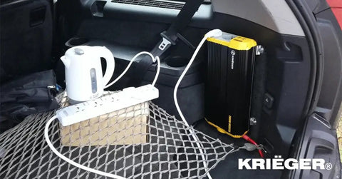Beast Mode 1500 Watt Power Inverter 12V To 110V Modified Sine Wave Car Converter with kettle and power strip in trunk.