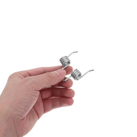 Fix Your Wobbly Folding Wagon Handle With This Super Quick Snap On Torsion Spring Metal Kit No Tools Needed Just Pop It In And Get Back To The Yard Or Beach Hassle Free For Real, silver metal spring in hand