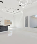Modern kitchen concept with white cabinets, black island, and sleek ceiling AC vents showcasing a clean, stylish interior.