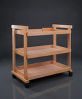 Sturdy Beech Wood Rolling Art Supply Cart With Wide Three Tier Shelves Secure Side Guards And Silky Smooth Wheels, angled view.