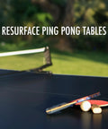 Outdoor ping pong table with net and paddles in sunny garden setting, showcasing surface ideal for recreational play.