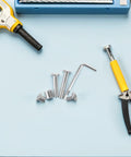 Inline Skate Axle Replacement Screws 6mm And 6.3mm Silver Alloy Bolts with skate tool on blue surface