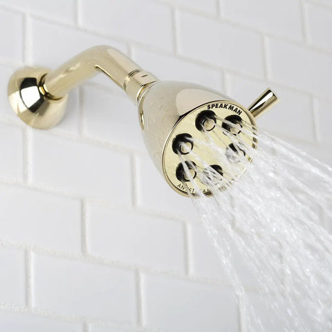 Polished Solid Brass Shower Head With Anystream Technology Three Settings Dope Water Flow For A Customizable Spa Like Shower Experience Durable Bathroom Fixture mounted on white tile