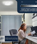 Woman working in office with Dimmable LED Ceiling Light With Dope Double Ring Design For Hallways Bedrooms Closets And Kitchens 22W 1800 Lumens 5 Color Temperatures Brushed Nickel ETL Listed Energy Saving Fixture showing dimming settings.