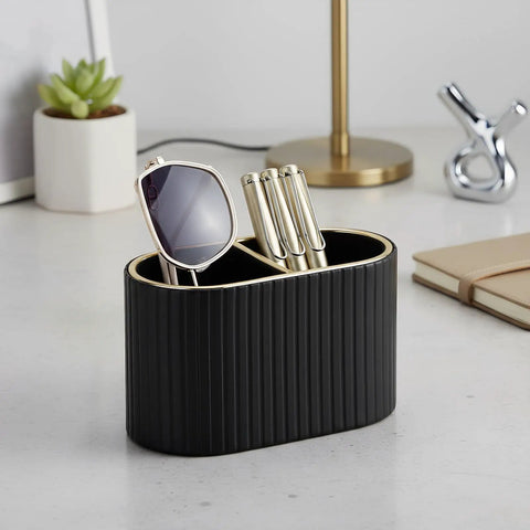 PU Leather Desk Organizer Pen Holder With Dual Compartment Pencil Cup And Remote Control Storage Black on a desk with accessories