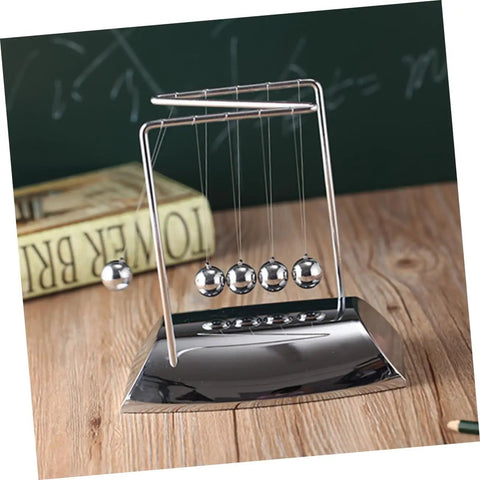 Z Shape Desktop Pendulum Balls Toy For Newtons Cradle Learning Five Ball Physics Experiment Kit displayed on a wooden desk