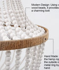 Close-up of Four Light Wood Beaded Boho Farmhouse Pendant Chandelier with white beads and hemp rope detailing.