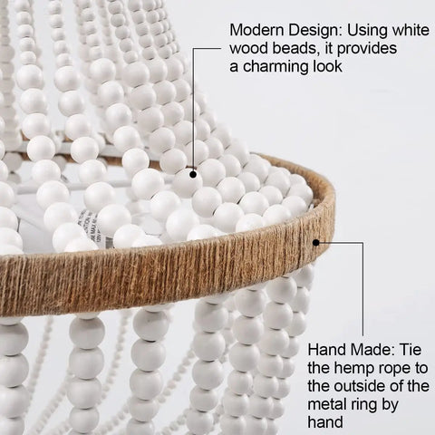 Close-up of Four Light Wood Beaded Boho Farmhouse Pendant Chandelier with white beads and hemp rope detailing.