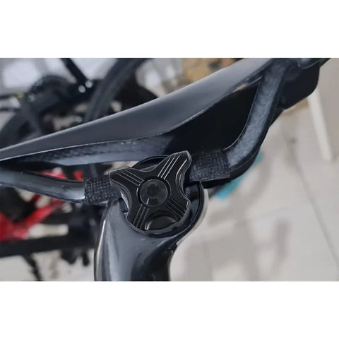 Close-up of a bike seatpost ear clamp with 7x9 titanium bolt for carbon rails. CNC aluminum clamp, part of the Bike Seatpost Ear Clamp 7x9 Titanium Bolt Kit For Carbon Rails CNC Aluminum Clamp Lightweight And Durable Your Go To Upgrade For Trek Domane Emonda SLR 9 7 6 SL Series.