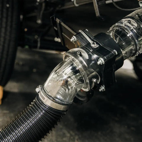 Ready-To-Use Gate Valve With Built-In Clear Adapter For 3-Inch Sewer Fittings showing see-through installation on RV.