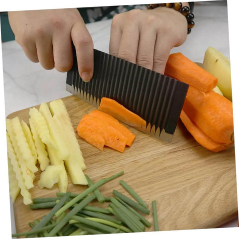 LIFKOME wavy cutter for vegetables and fruits, stainless steel crinkle slicer; hands slice carrot and potato on a wooden board