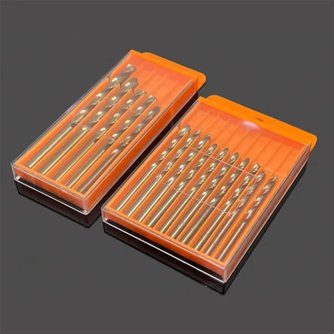 Orange Plastic Drill Bits Storage Box With Pull Out Design and visible twist drills inside, shown on a gray background.