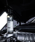 Perl Coat Plastic And Rubber Protectant For Cars on engine, 500 mL bottle revives dull surfaces with UV shield, lasts three months.
