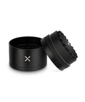 Toothless 2.5 Inch Aluminum Spice And Herb Grinder With Extra Storage Compartment shown open, matte black durable aluminum body.