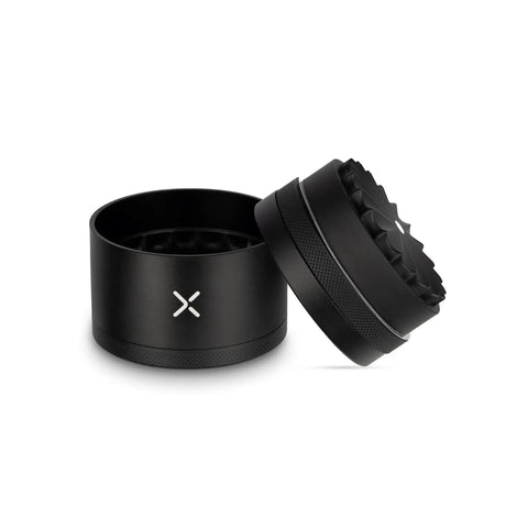 Toothless 2.5 Inch Aluminum Spice And Herb Grinder With Extra Storage Compartment shown open, matte black durable aluminum body.