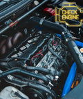 Car engine with illuminated check engine light indicating a need for repair or maintenance