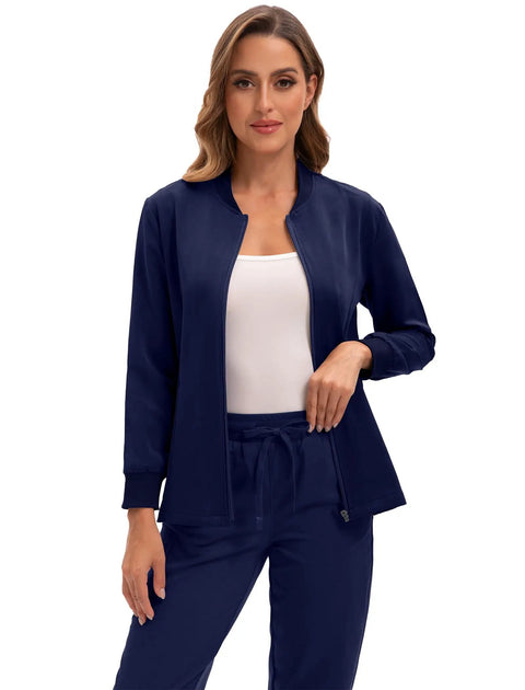Women Go To Zip Front Scrub Jacket Four Pocket Medical Top Ultra Soft Stretch Uniform Coat worn by model in navy color.
