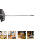 Dark Grey Angle Floor Broom With Long Stainless Steel Handle And Dense Stiff Bristles snags pet hair and kitchen messes.