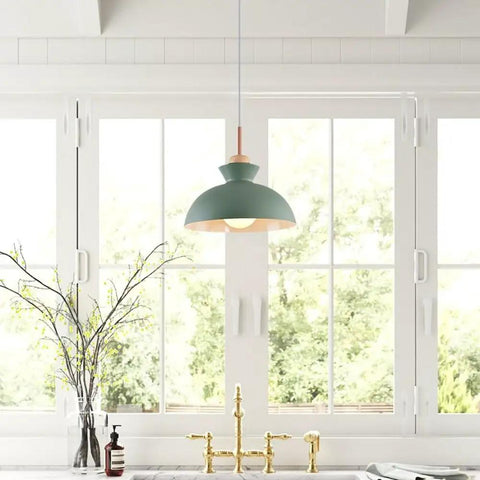 11inch Wood Pendant Light,Retro Wooden Hanging for Kitchen Island with matte green metal shade in bright window setting.
