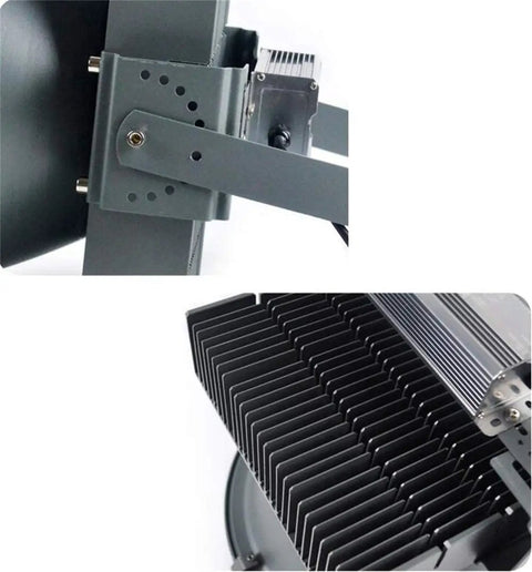 Close-up of Heavy Duty Portable Floodlight And Spotlight Kicking Out Blindingly Bright Led Beams for outdoor construction sites showing aluminum housing.