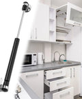 10 Inch Gas Struts Set Of 4 With 45N 10Lb Lift Supports for RV Cabinet Doors, shown in modern kitchen setup