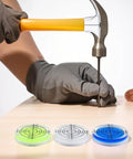 Round Bubble Level 32mm 12 Pack Circular for spirit Levels for acrylic with hammer and two vibrant levels on a wooden surface.
