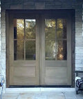 Legit Reactive Water Based Wood Stain With A Slick Reclaimed Vibe Weathered Tan Tones on double entry doors.