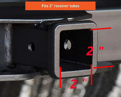 Close-up of a 2-inch receiver tube fitting on a vehicle, part of the All American Patriotic Trailer Hook Cover And Lock Set For 2-Inch Receiver, Heavy Duty Aluminum Housing With American Flag Emblem, Includes Hook Lock And Two Keys, Durable, Easy Install, Protection And Style.
