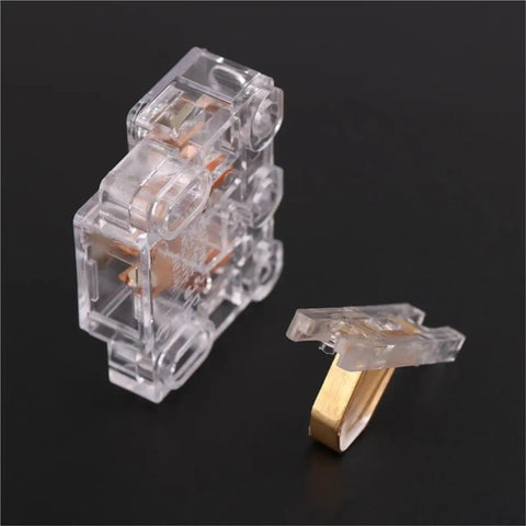 Hella Durable Rx07 Elevator Door Lock With Auxiliary Contact Switch Designed For Commercial Elevators And Passenger Lifts, clear plastic assembly with a gold contact.