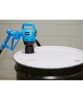 Heavy Duty Electric Drum Pump Pulls Four Gpm Real Smooth With 110V AC Plug In Power positioned on a 55 gallon barrel.