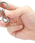 Person holding Stainless Steel Spring Snap Hook Carabiner Clip, part of set of 6 for camping, hiking ropes, keys, and gear 286 pound load capacity
