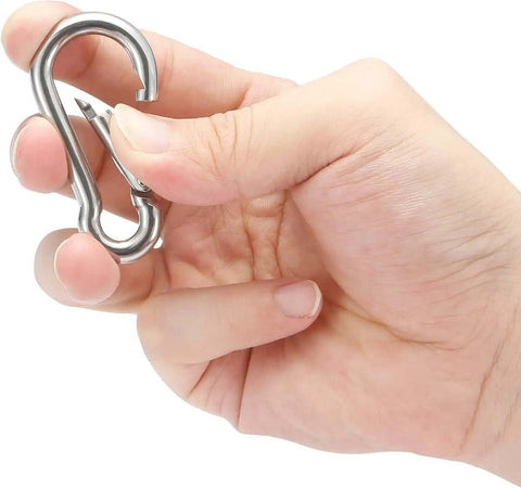 Person holding Stainless Steel Spring Snap Hook Carabiner Clip, part of set of 6 for camping, hiking ropes, keys, and gear 286 pound load capacity