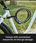 Set Your Own Four Digit Combination Bike Lock With Braided Steel Cable Mounted on White Bicycle Frame for On-the-Go Storage