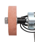 Close-up of No Hassle Workhorse Mini Belt Sander and Knife Sharpener's grinding wheel and motor for precise hobby buffing.