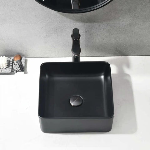 Sleek Matte Black Rectangle Vessel Sink 14 By 14 Inch Above Counter Vanity With Porcelain Ceramic Low Water Absorption Acid Resistant Easy To Clean Surface Durable Modern Bathroom Vessel Sink With Black Pop Up Drain
