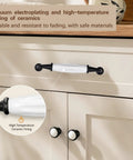 Slick Farmhouse Cabinet Knobs And Pulls Set 12 Piece Hardware Kit Featuring 5 Inch Center To Center Spacing White Ceramic Centers And Matte Black Alloy Bases drawer handle with ceramic top and black alloy end caps.
