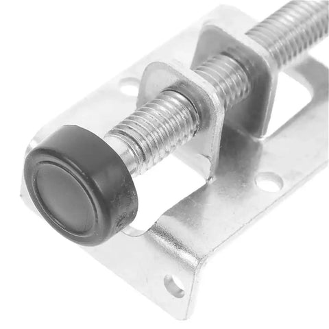 Close-up of adjustable foot pad leveler with threaded height adjustment and solid metal frame for tables chairs cabinets and workbenches
