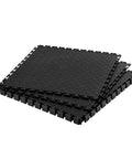 Stack of interlocking garage floor tiles 12 inch square 25 pack graphite grey non slip diamond plate covering for basements and gyms.
