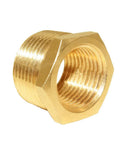 Close-up of a brass pipe fitting reducer hex bushing, showing threads, for converting three quarter inch NPT male to half inch NPT female.