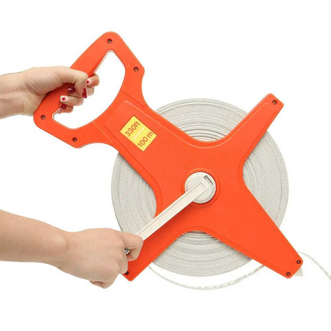 Open Reel Tape Measure With Retractable Blade, 300 Feet Dual Sided Tape For Track And Field, Long Jump, Construction, held with wind crank