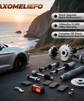 Assorted auto parts including brake pads, rotors, and wheel bearings on coastal road with a sunset view background.