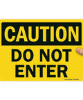 Heavy Duty Caution Do Not Enter Sign 10 X 14 Inches Thick Hdpe Plastic Safety Marker displayed in hand with clear message.