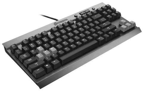 Goat Tier Compact Tenkeyless Mechanical Gaming Keyboard Featuring Cherry MX Red Switches For Hella Rapid Key Taps And A Clean Workstation Layout That Truly Slays During Marathon Sessions, angled view with black keys and metal frame.