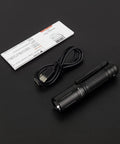 EDC Pocket Light Archer Pro High Lumen Output USB C Rechargeable LED Flashlight with cable and manual on black surface