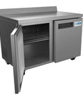 Built Tough 48 Inch Stainless Steel Commercial Worktop Freezer With Dual Doors And Sturdy Backsplash, showing open door and interior racks.