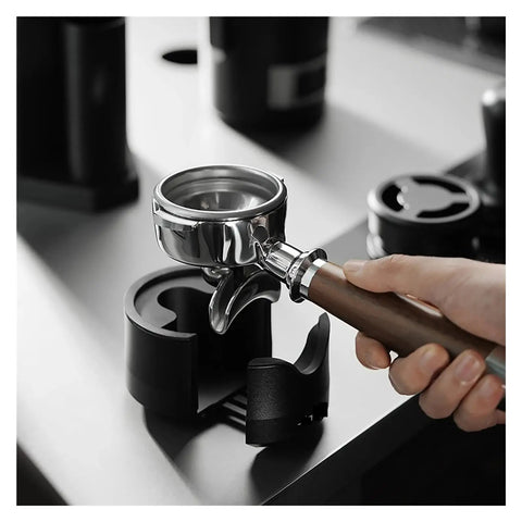 Adjustable Portafilter Holder And Tamping Base For Espresso Machine Compatible With 51mm 53mm And 58mm Filters Sturdy Aluminum Build close-up of portafilter.